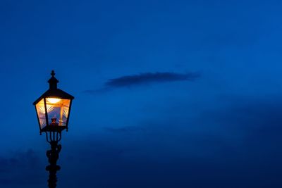 Low angle view of illuminated street light