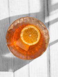 Close-up of lemon slice on table