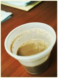 Close-up of coffee cup on table