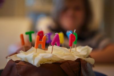 Close-up of birthday candles on cake