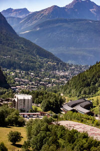 High angle view of trees and mountains against sky