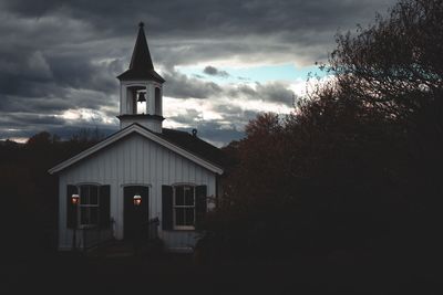 Exterior of house against sky at dusk