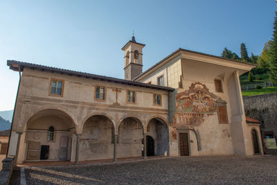 Low angle view of historic building against clear sky