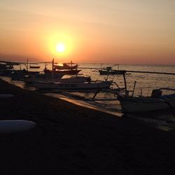 Scenic view of sea at sunset