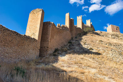 Ruins of the historic medieval walls in albarracin, teruel