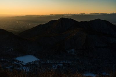 Scenic view of mountain against sky during sunset