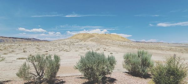 Panoramic view of desert against sky