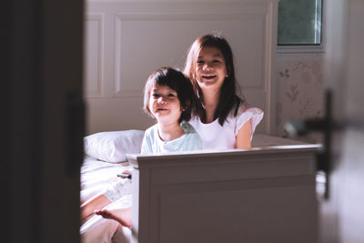 Portrait of smiling girl at home