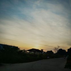 Scenic view of silhouette trees against sky during sunset