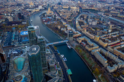 High angle view of river amidst buildings in city