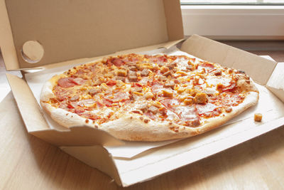 Close-up of pizza in box