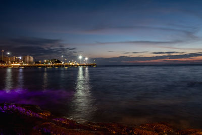 Scenic view of sea against sky at night