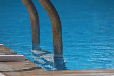 Close-up of swimming pool ladder