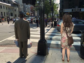 People walking on city street