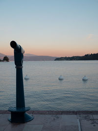 Scenic view of sea against clear sky during sunset