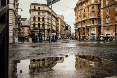 Wet street in city during rainy season