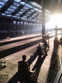 People on railroad station platform