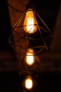 Low angle view of illuminated light bulb