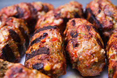 Close-up of meat on barbecue grill