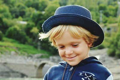 Portrait of cute boy wearing hat
