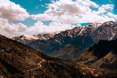 Scenic view of snowcapped mountains against sky