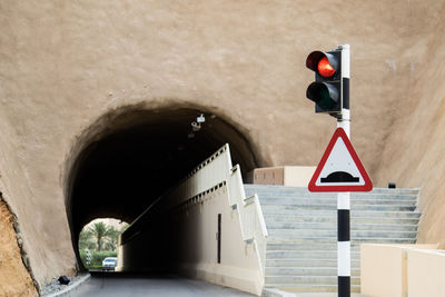 Road signal by tunnel