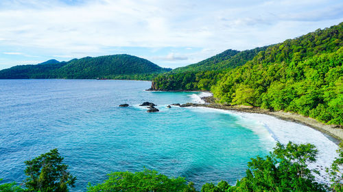 High angle view of sea against cloudy sky