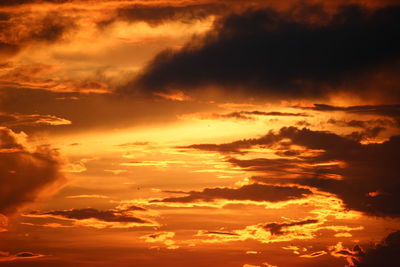 Low angle view of clouds in sky during sunset