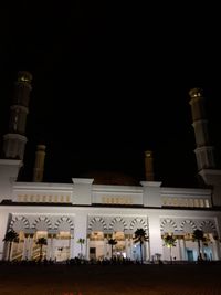 Low angle view of historical building at night