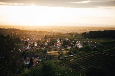 High angle view of townscape against sky during sunset