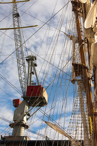 Low angle view of ship moored against sky