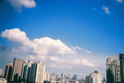 Modern buildings against blue sky