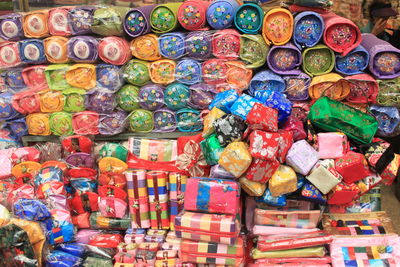 Full frame shot of various pouches for sale at market stall