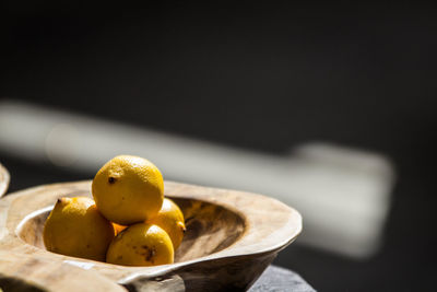 Close-up of fruits in bowl on table