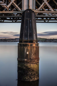 View of bridge over river against sky