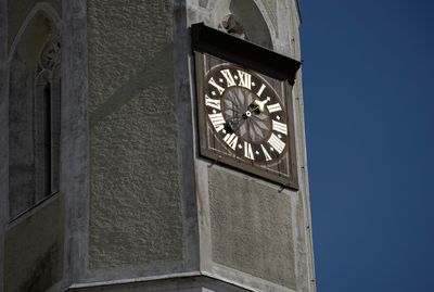 Low angle view of building against blue sky