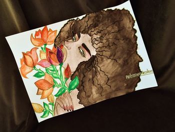 High angle view of multi colored paper on table