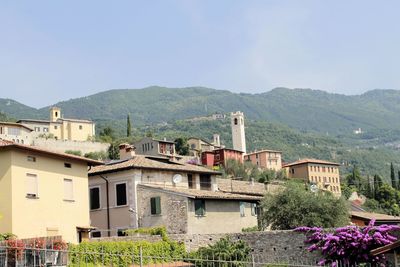 Residential buildings against mountain range