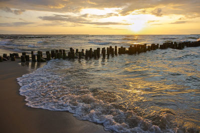 Scenic view of sea against sky during sunset