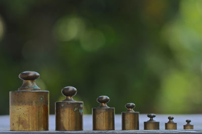 Close-up of candles on wood