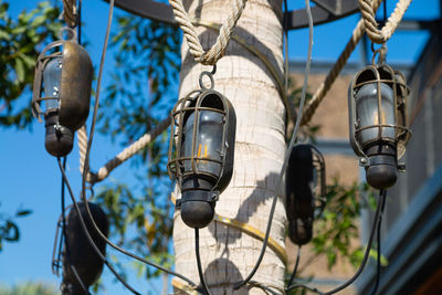 Low angle view of street light against building