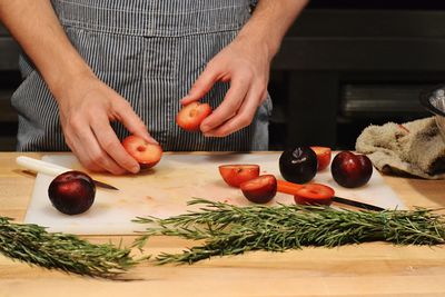Cropped image of person holding knife