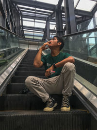 Man sitting on staircase