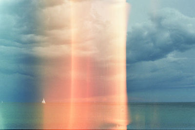 View of sea against cloudy sky