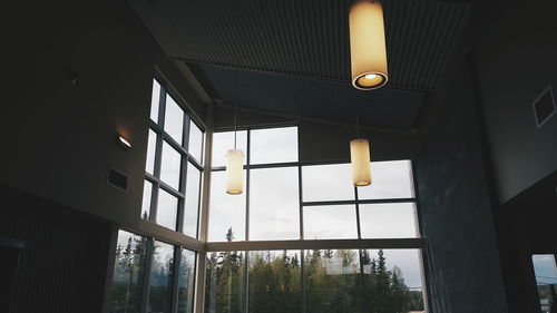 Low angle view of illuminated lamp post at night