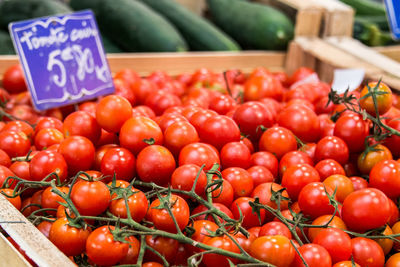 Tomatoes for sale at market stall