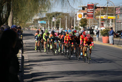 Group of people on road in city