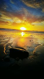 Scenic view of sea at sunset