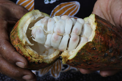 Close-up of man holding cocoa