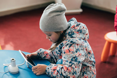 Young woman using mobile phone